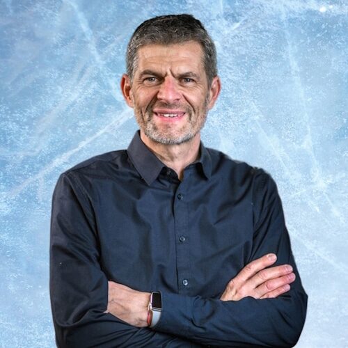 Textured ice blue frozen rink winter background